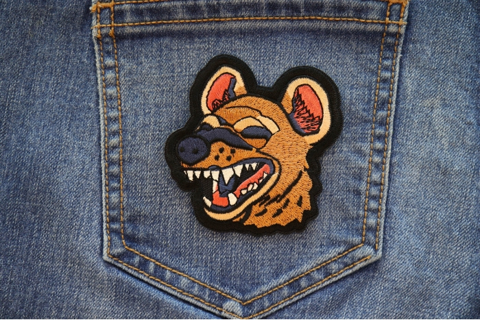 Laughing Hyena Iron on Patch shown on jeans