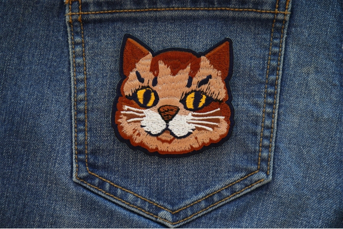 Mister Cat Iron on Patch shown on jeans