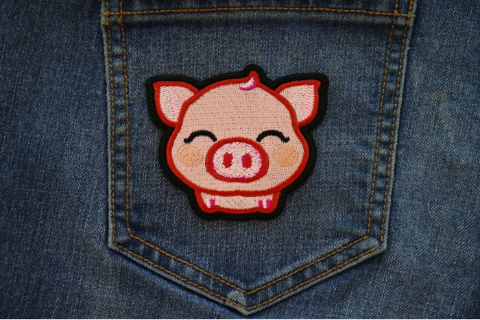 Piglet Iron on Patch shown on jeans