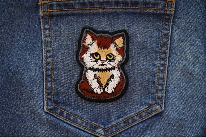 Sad Kitty Cat Iron on Patch shown on jeans