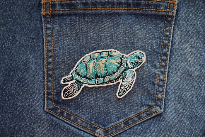 Sea Turtle Patch shown on jeans