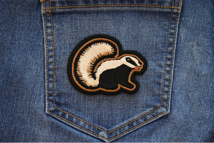 Skunk Patch shown on jeans