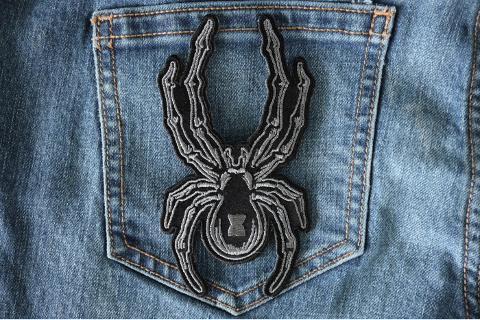 Arachnid Patch Iron On  shown on jeans