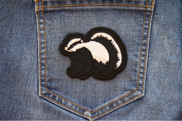 Skunk Patch shown on jeans