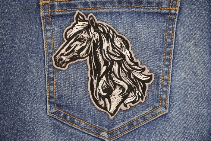Tribal Horse Patch shown on jeans