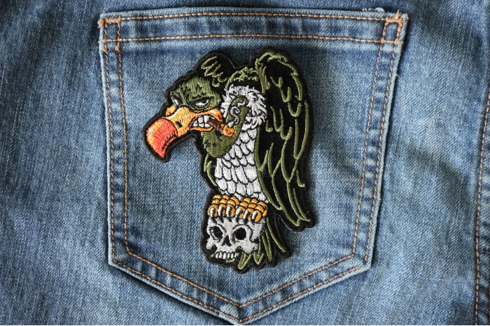 Vulture On Skull Patch shown on jeans
