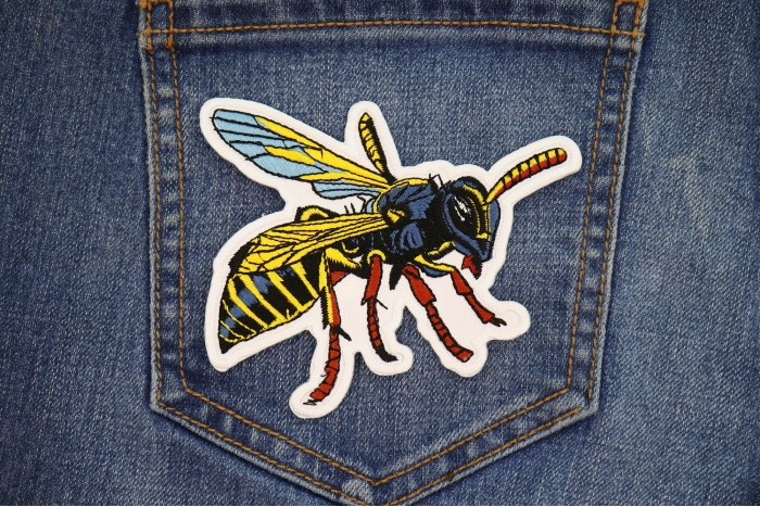 Wasp Patch shown on jeans