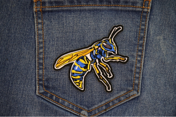 Wasp Patch shown on jeans