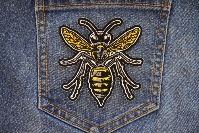 Wasp Patch shown on jeans