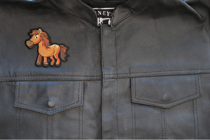 Cartoon Horse Patch shown on leather vest