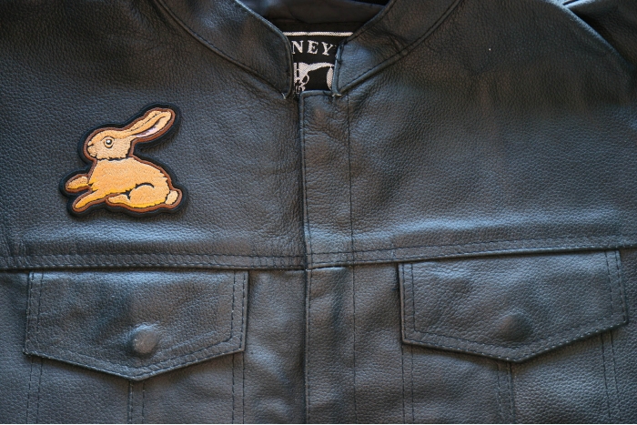Cute Rabbit Iron on Patch shown on leather vest