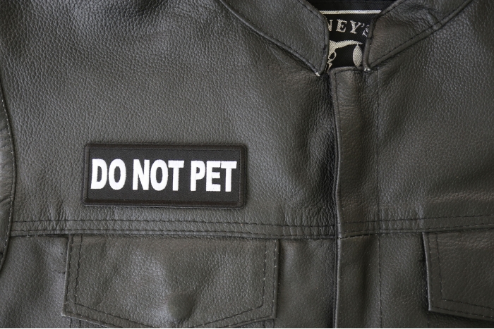 Do Not Pet Patch - 4x1.5 inch - Embroidered Iron on Patch shown on leather vest