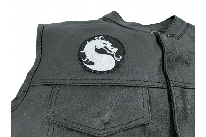 Dragon Patch Small Circular - 3x3 inch. Embroidered Iron on Patch shown on leather vest