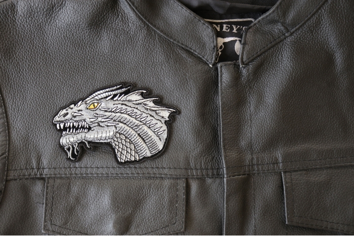 Dragon Patch Small with Yellow Eyes - 4.6x3.3 inch - Embroidered Iron on Patch shown on leather vest