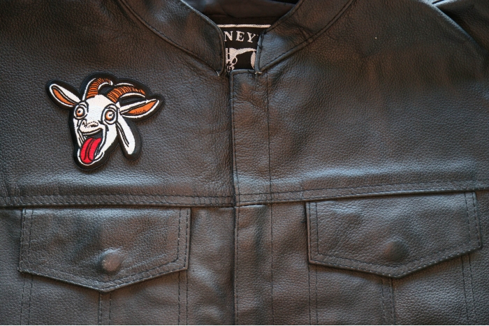 Funny GOAT Iron on Patch shown on leather vest