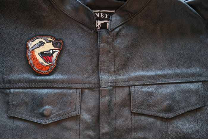 Funny Hyena Iron on Patch shown on leather vest