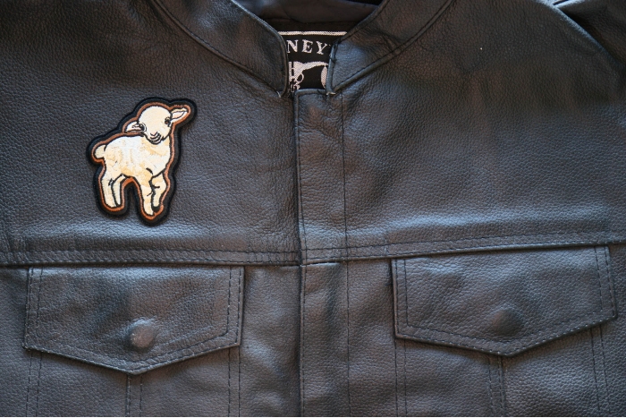 Baby Lamb Iron on Patch shown on leather vest