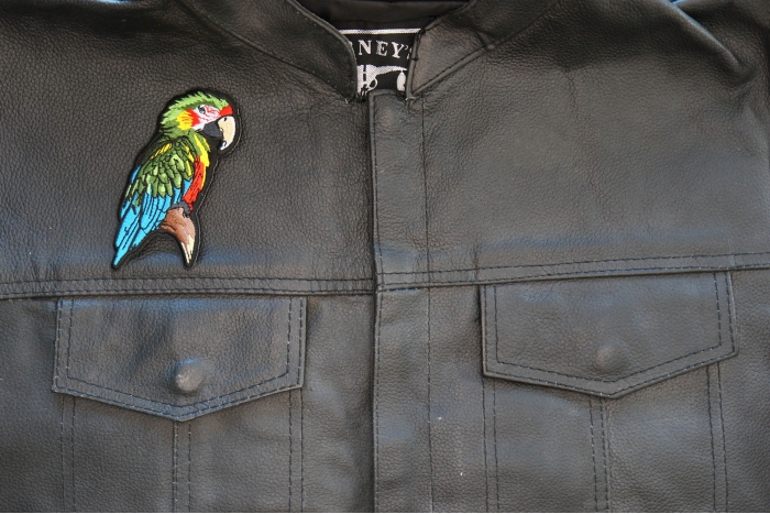 Parrot Patch shown on leather vest