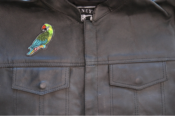 Parrot Patch shown on leather vest