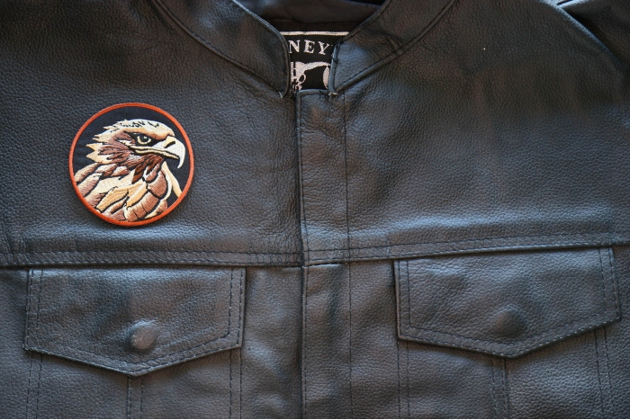 Speedy Hawk Iron on Patch shown on leather vest
