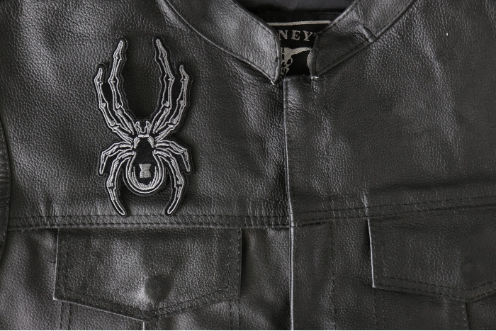 Spider Patch - 2.7x5 inch - Embroidered Iron on Patch shown on leather vest