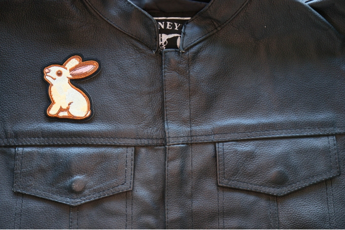 Sweet Rabbit Iron on Patch shown on leather vest