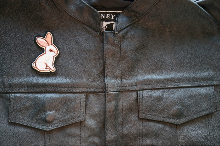 Sweet Rabbit Iron on Patch shown on leather vest