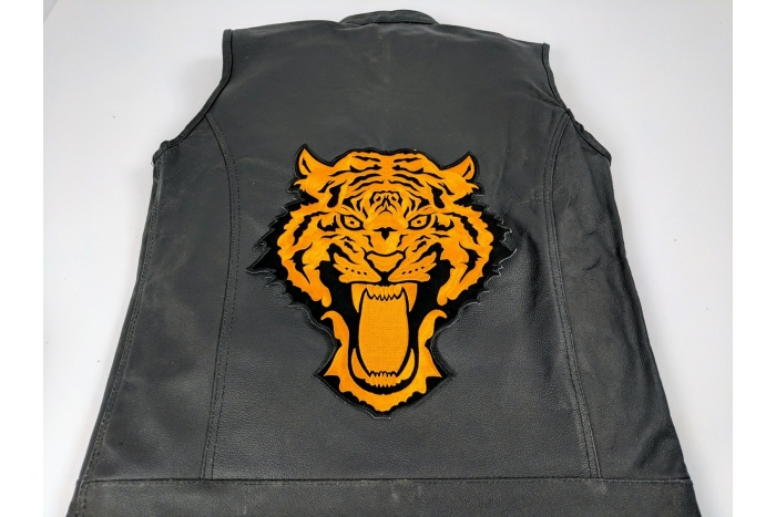 shown on leather vest
