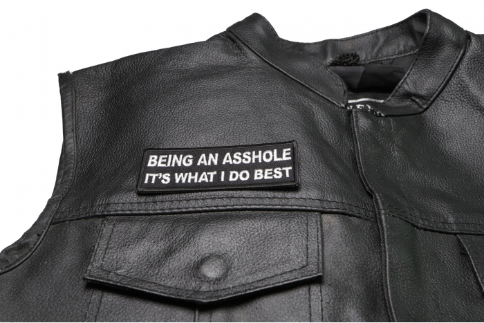 Being an Asshole It's What I do Best Patch - 4x1.5 inch. Embroidered Iron on Patch shown on leather vest