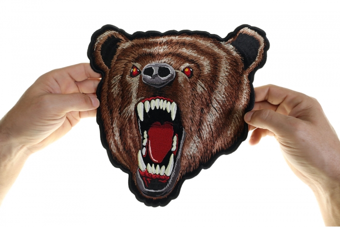 Bear Patch, Large Animal Patches for Jackets shown on hand for size comparison