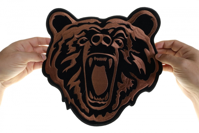 Bear Patch, Large Animal Patches for Jackets shown on hand for size comparison