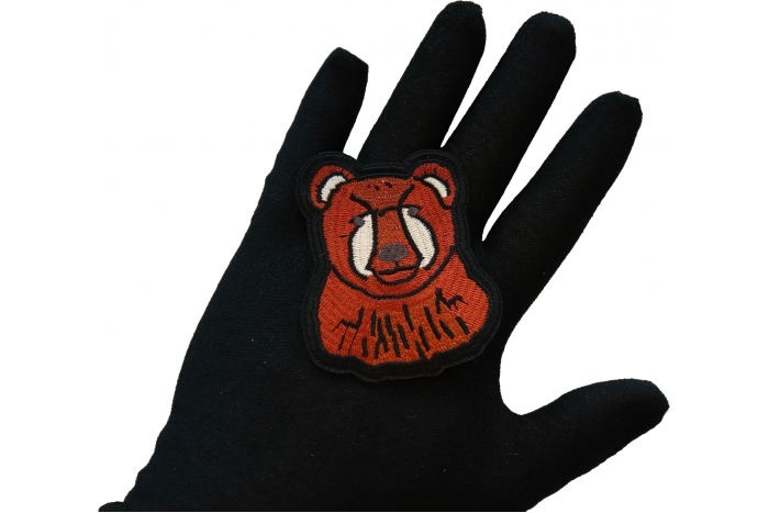 Cute Bear Iron on Patch shown on hand for size comparison