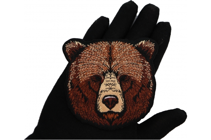 Cute Bear Patch shown on hand for size comparison