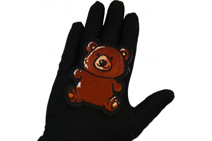 Teddy Bear Patch shown on hand for size comparison