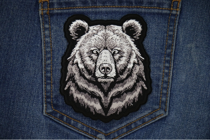 Bear Stare Patch shown on jeans