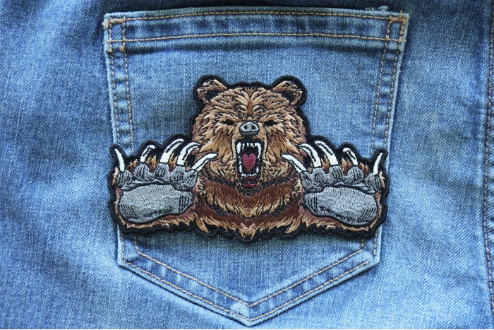 Brown Bear Claws Iron on Patch shown on jeans