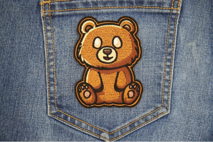 Brown Bear Patch shown on jeans