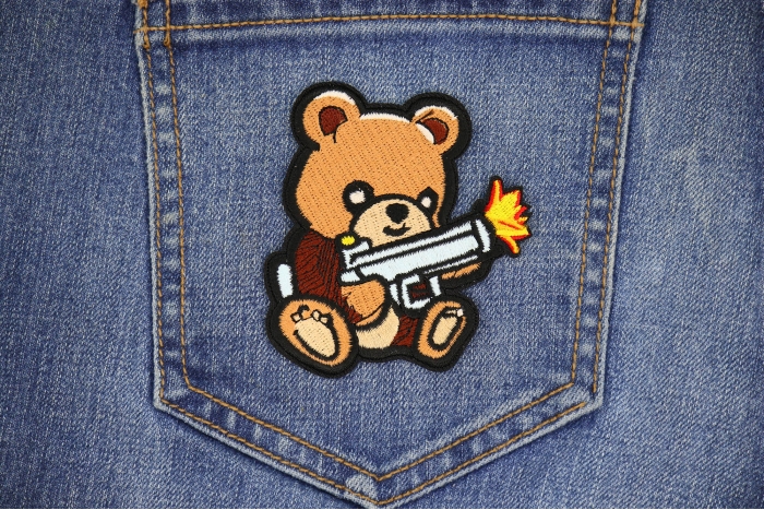 Cute Bear Machine Gun Patch shown on jeans