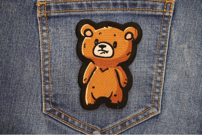 Scared Bear Patch shown on jeans