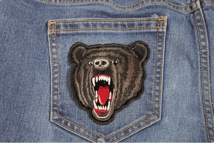Small Black Bear Biker Iron on Patch shown on jeans