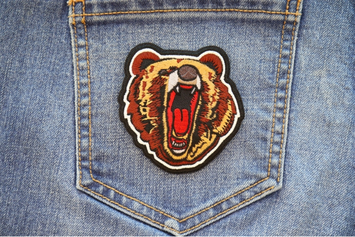 Yawning Bear Iron on Patch shown on jeans
