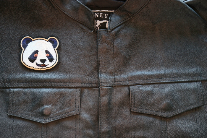 Panda Iron on Patch shown on leather vest