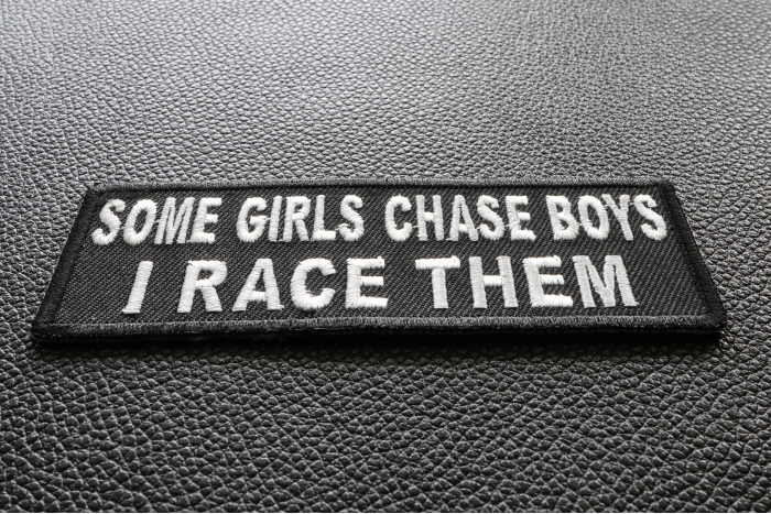 Some Girls Chase Boys I Race Them Patch diagonal view