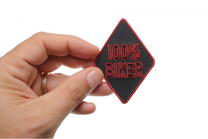 100 Percent Biker Patch, Biker Saying Patches shown on hand for size comparison