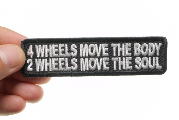 4 Wheels Move The Body 2 Wheels Move The Soul Patch, Biker Saying Patches shown on hand for size comparison