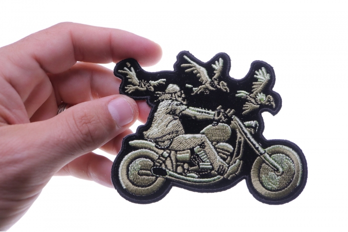  shown on hand for size comparison