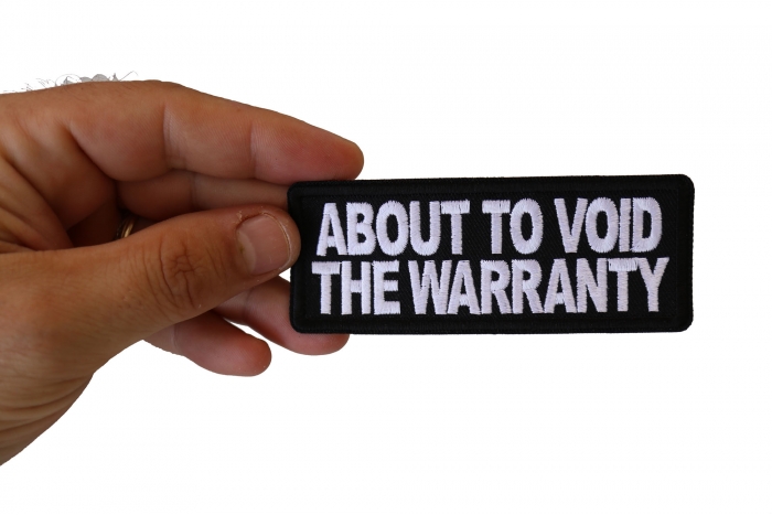 About to Void the Warranty Patch, Biker Saying Patches shown on hand for size comparison