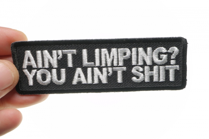 Ain't Limping Aint Shit Patch, Biker Saying Patches shown on hand for size comparison