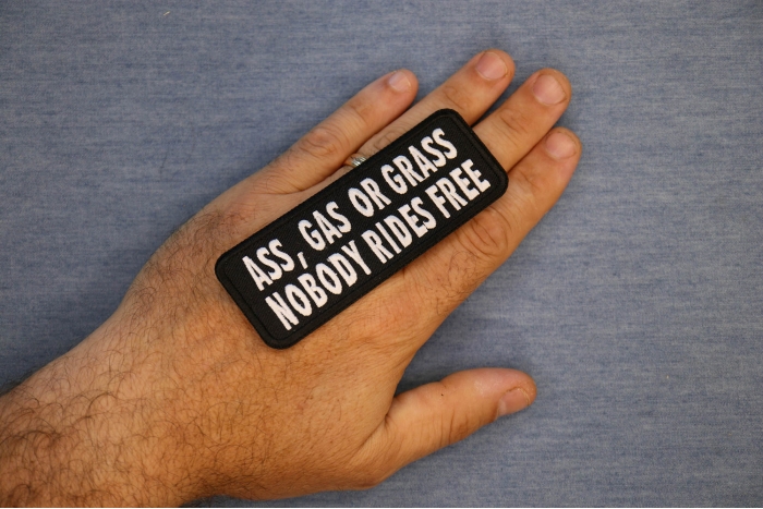 Ass Gas or Grass Nobody Rides Free Patch, Biker Saying Patches shown on hand for size comparison