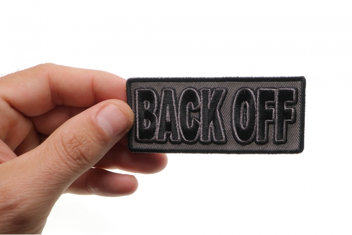  shown on hand for size comparison